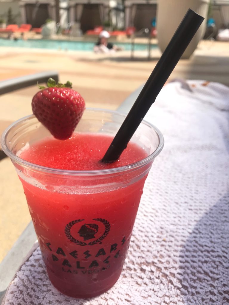 strawberry daiquiri by the pool