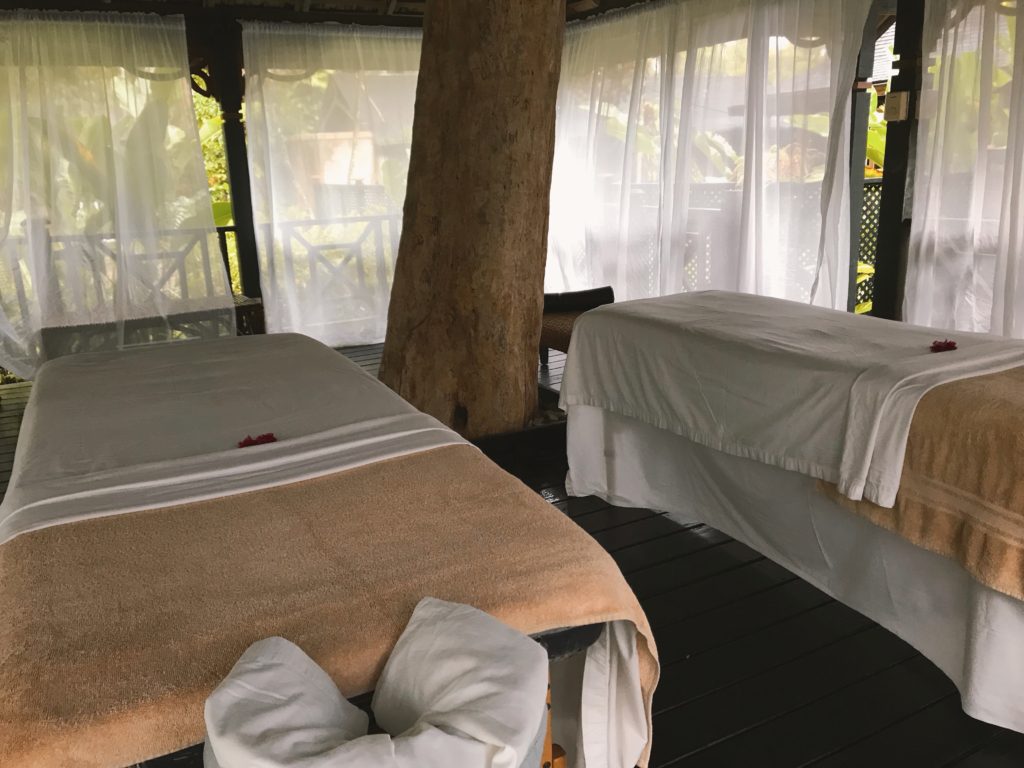massage tables in an outdoor canopy room